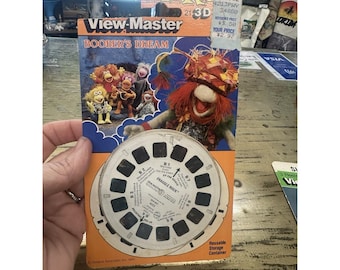 Tres carretes View-Master de Fraggle Rock de colección en su embalaje original.