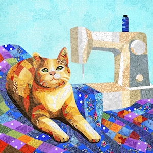 May include: A patchwork quilt with a ginger cat lying on it. A sewing machine is on top of the quilt, with a spool of thread on top of the machine.