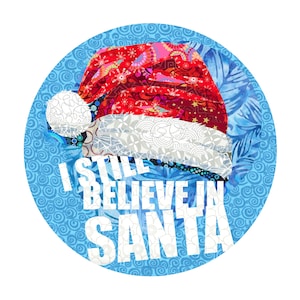 May include: A blue circle with a white background and a red and white Santa hat. The text "I still believe in Santa" is written in white letters.