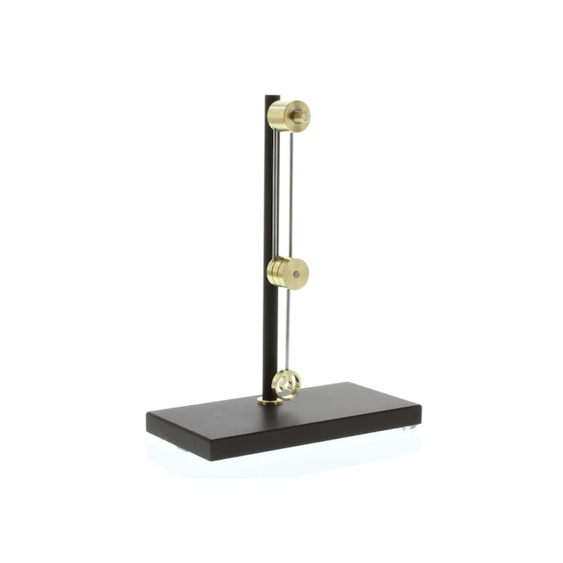 May include: A black metal stand with a gold metal pendulum and two gold metal weights. The stand has a rectangular base.