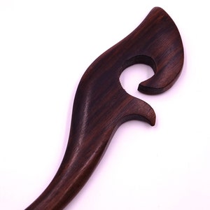 Wood-haired pic baguette bun sculpted handcrafted hairstyle