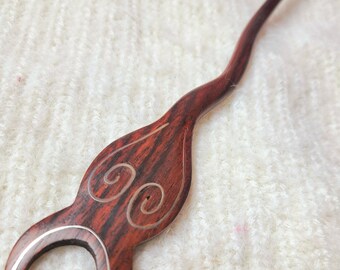 Carved wooden hairpick