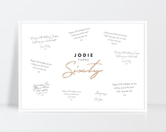 May include: A white framed photo with a gold inscription that reads "JODIE TURNS SIXTY". The photo is filled with handwritten birthday messages.