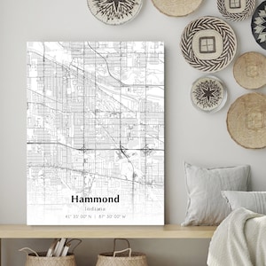 May include: A black and white map print of Hammond, Indiana with the city's name and coordinates printed below the map.