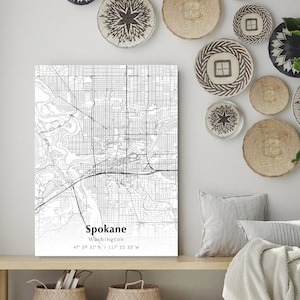May include: Black and white map print of Spokane, Washington with the city's name and coordinates printed below the map.
