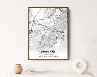 May include: A black and white map print of Jersey City, New Jersey, with a gold frame. The map shows the city streets and waterways. The text "Jersey City" and "New Jersey" are printed at the bottom of the map, along with the coordinates "40° 43' 41° N 74° 04' 39" W".