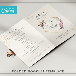 May include: A folded wedding booklet template with a floral design and gold accents. The front cover features the names "Stephanie & George" and the text "Welcome to the wedding of". The back cover includes the text "Thanks" and a list of wedding party members.