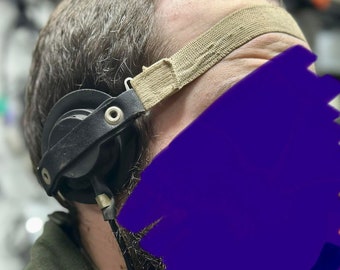 Laryngophone A microphone laryngé Microphone de contact / microphone aviation