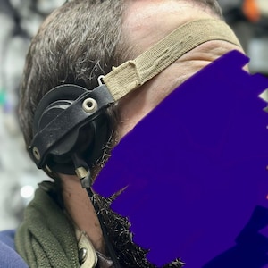 Laryngophone A throat microphone Contact microphone / aviation microphone
