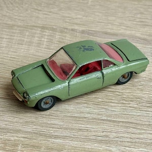 Toy model car Fiat 1500 Siata 1/43 scale Car with a red car interior