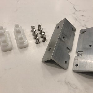 BKS001L - Bottom Drawer / Top Drawer conversion kit - low height triggers for non-BLUM runners (UK, France, Italy)