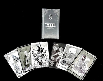 May include: A set of playing cards with black and white illustrations. The cards feature a skull and the text "XIII A Tarot Deck illustrated by Martin."