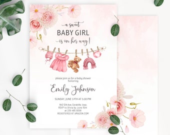 May include: A pink baby shower invitation with a floral design and a line of baby items hanging on a clothesline. The text reads "a sweet BABY GIRL is on her way!" and includes the name "Emily Johnson" and details for the shower.