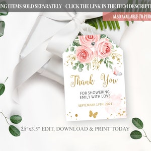 May include: A white thank you tag with gold lettering and pink watercolor flowers. The text reads "Thank You" for showering Emily with love, September 17th, 2021. The tag is 2.5 inches by 3.5 inches.