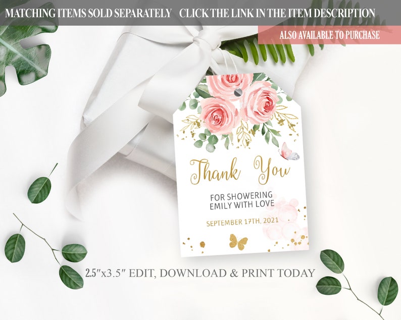 May include: A white thank you tag with gold lettering and pink watercolor flowers. The text reads "Thank You" for showering Emily with love, September 17th, 2021. The tag is 2.5 inches by 3.5 inches.