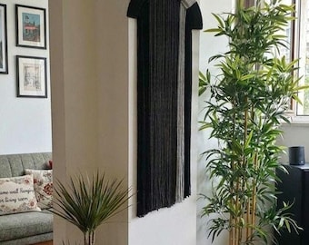 Decorazione da parete in macramè in stile boho, realizzata in fibra di cotone naturale, un arazzo minimalista.