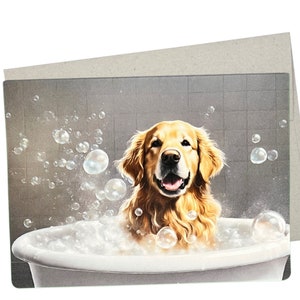 May include: A golden retriever dog sits in a white bathtub filled with bubbles. The dog is smiling and looking at the camera. There are many bubbles floating in the air around the dog.