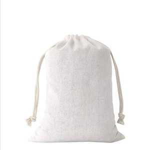 May include: A plain white cotton drawstring bag with a natural cotton cord.
