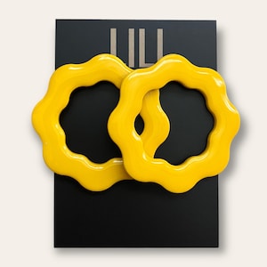 Yellow flower hoop stud earrings made from polymer clay