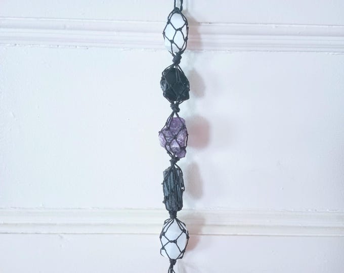 Protection macrame crystal wall hanging with selenite, black tourmaline, dream amethyst, black obsidian, and clear quartz