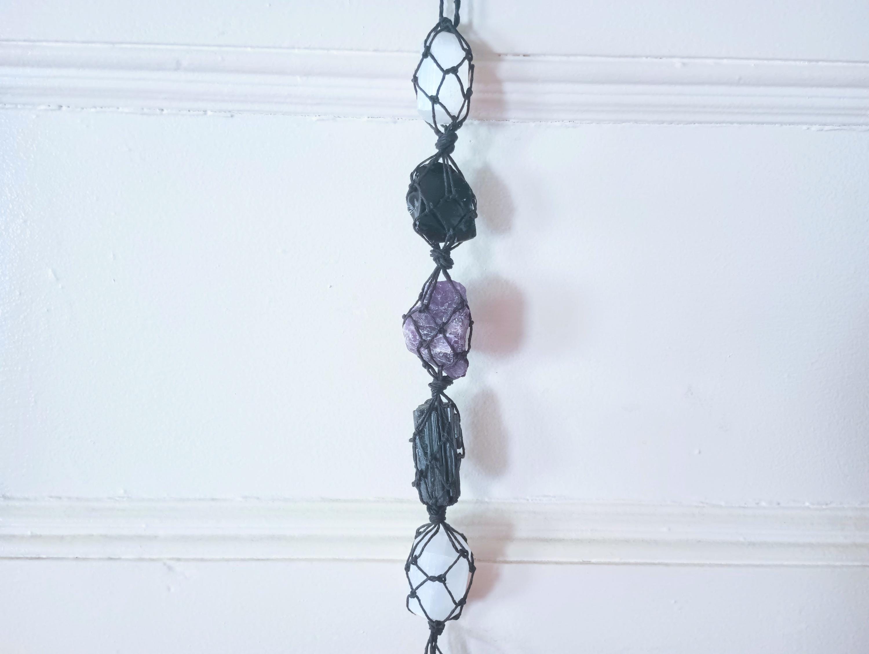 Protection macrame crystal wall hanging with selenite, black tourmaline, dream amethyst, black obsidian, and clear quartz