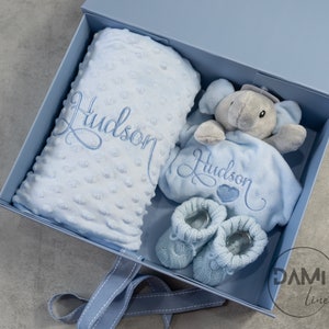 Personalised baby boy gift set. Blue Blanket, blue elephant comforter and blue knitted booties.