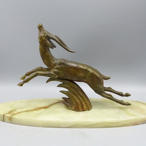 Art deco image of jumping deer