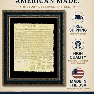 May include: Framed Declaration of Independence document. The document is in a black frame with a gold trim. The text reads "PREMIUM QUALITY. AMERICAN MADE." and "HONOR OUR PAST. SUPPORT AMERICAN."