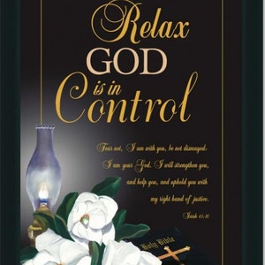 May include: A framed print with a black background and gold lettering that reads "Relax GOD is in Control". The print features a Bible, white flowers, and a lit oil lamp. The scripture "Fear not, I am with you, be not dismayed: I am your God. I will strengthen you, and help you, and uphold you with my right hand of justice. Isaiah 41:10" is printed below the main text.