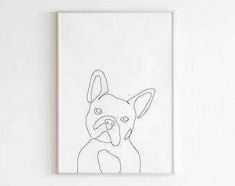 May include: Minimalist black line art print of a French Bulldog's face. The artwork is a simple, continuous line drawing on a white background, framed in a silver frame. The dog's features are clearly defined.
