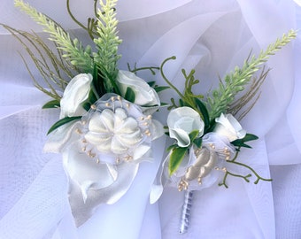 White corsage and boutonniere set
