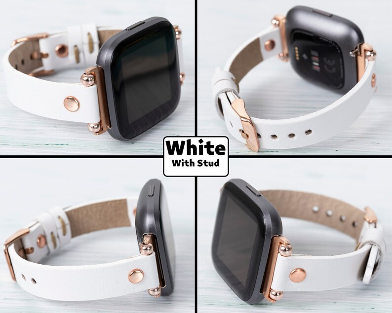 May include: White leather watch band with rose gold accents and studs. The band is compatible with a square-shaped smartwatch.