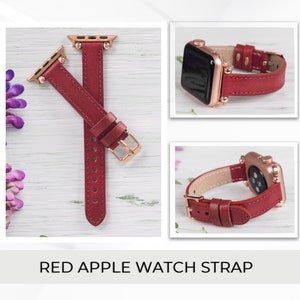 May include: Red leather Apple Watch band with rose gold hardware. The band is shown on a white wooden surface.