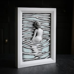 Female wall art sculpture highly detailed hand painted artwork.