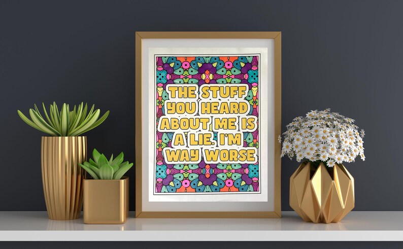 May include: A framed print with a colourful psychedelic background and the text "The stuff you heard about me is a lie. I'm way worse."