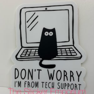 May include: A white sticker featuring a black cartoon cat sitting in front of a laptop. The text "DON'T WORRY I'M FROM TECH SUPPORT" is below the laptop. The sticker also includes the text "The Sticker Emporium".