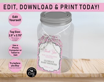 May include: Pink and silver glitter baby shower favor tag with the text "Thank You for celebrating with me! Gloria's Baby Shower October 25, 2019" attached to a clear glass jar with a silver lid.