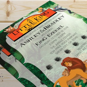 May include: A green and orange baby shower invitation with a lion king theme. The invitation reads "A Little King Is On His Way" and includes the names "Ashley & Bradley" and "King Ezekiel".