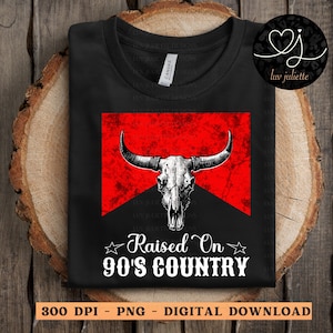 May include: A black t-shirt with a red and white graphic of a bull skull with the text "Raised On 90's Country".
