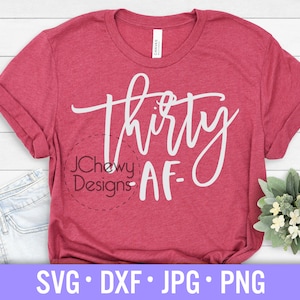 May include: Red t-shirt with white text that says "Thirty AF" in a cursive font.