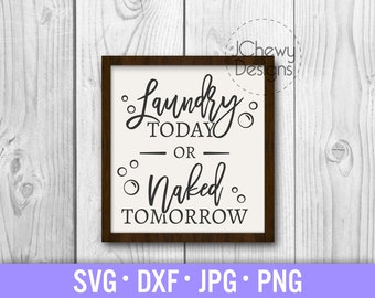 May include: A white sign with a brown wooden frame, featuring the text "Laundry Today or Naked Tomorrow" in black cursive font. The sign is decorated with small circles around the text.