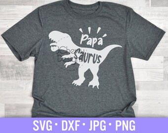 May include: A gray t-shirt with a white dinosaur silhouette and the text "Papa'saurus" on it.