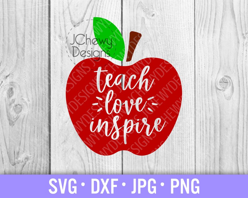 May include: Red apple with a green leaf and the text "teach love inspire" inside. The apple is on a white wood background.