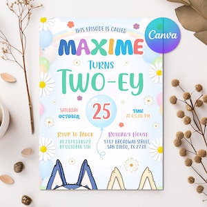 May include: A light blue invitation card with the text "MAXIME TURNS TWO-EY" and the date "OCTOBER 25". The card features a rainbow, daisies, and a cartoon character's ears. The Canva logo is in the upper right corner.