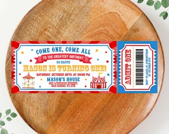 May include: A red, white, and blue circus ticket invitation for a birthday party. The ticket says "Come one, come all to the greatest birthday on earth, Mason is turning one!" The party is on Saturday, October 25th at 4:00 PM at Mason's House, 452 Wustoon Street, San Diego, TX 278. The ticket also has a barcode and says "RSVP to Mack at 270645178291 by October 5th."