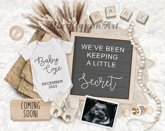 May include: A pregnancy announcement featuring a white onesie with "Baby Cope December 2023" printed on it, paired with baby booties, wooden blocks, and a sonogram. A letter board reads "We've been keeping a little secret."