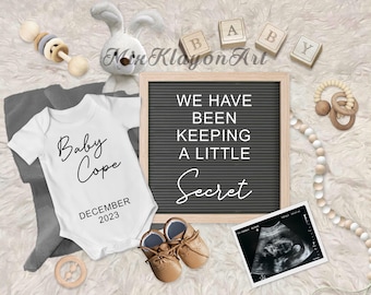 May include: A white onesie with the text "Baby Cope" and "December 2023" on it. A letter board with the text "We have been keeping a little secret" is in the background. There are wooden blocks spelling out "Baby" and a sonogram image.