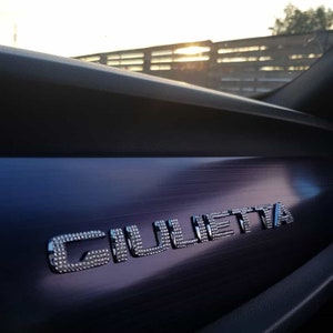 Original OEM Alfa Romeo |  Batch Logo Emblem writing Giulietta | refined with Preciosa® crystals | biscone cuore sportivo bling