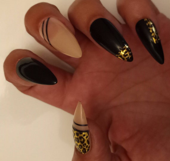 black and gold stiletto nails tumblr