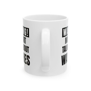 May include: White ceramic coffee mug with a curved handle. The mug features black text that reads "WARNING! I MIGHT START TALKING ABOUT WATCHES."